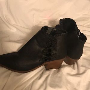 Black booties with side detailing
